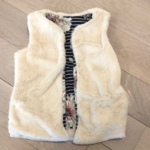 Reversible faux fur vest with pockets.  Size 8.